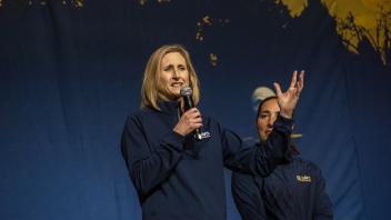 Jen Gross, the women's basketball coach and UC Davis alumni addresses the crowd